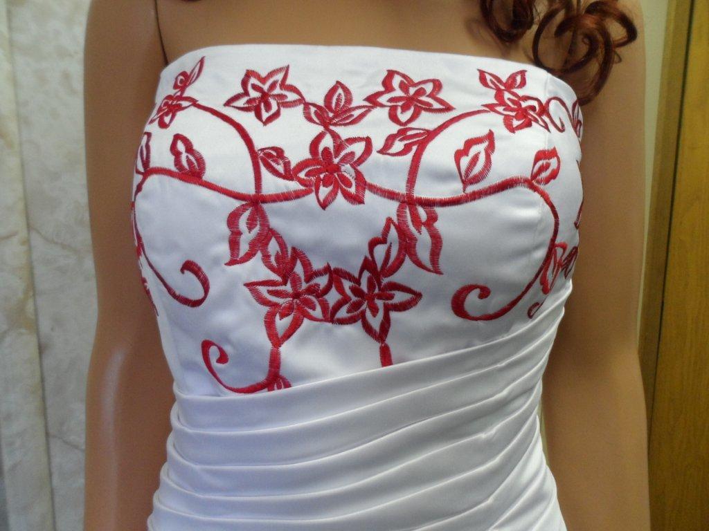 White wedding gown with red embroidery