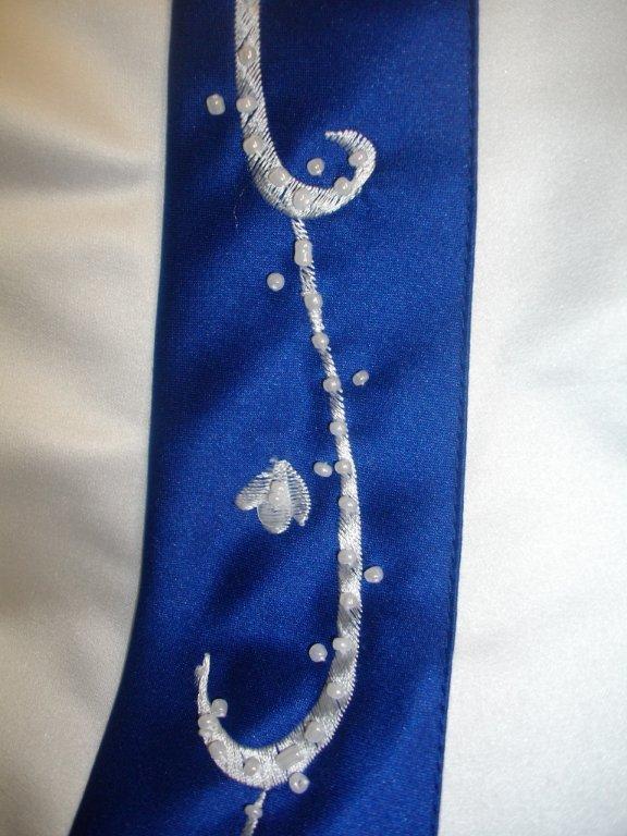 royal blue and white embroidery on wedding gown