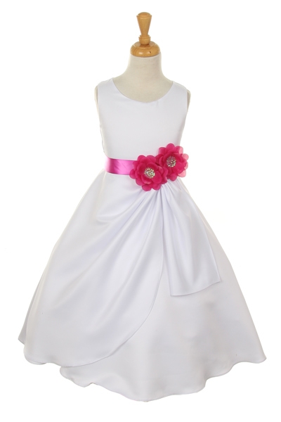white dress with magenta flower sash