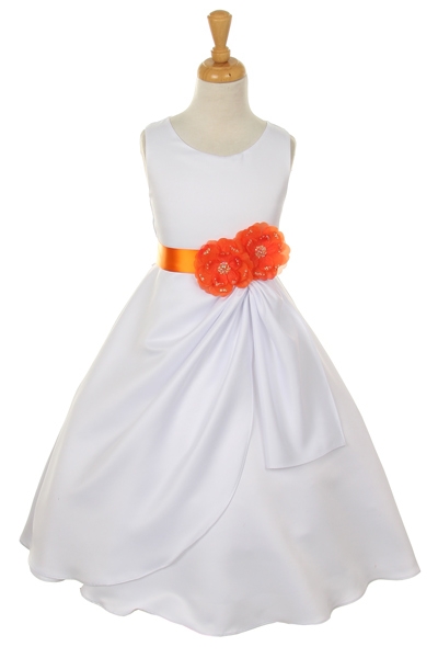 white dress with orange flower sash