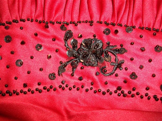 Red gown with black beading