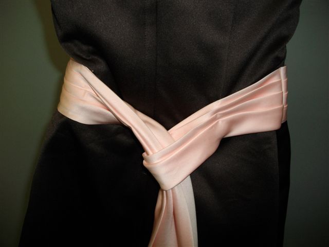 Pink pleated sash self loops in back for long tail sash
