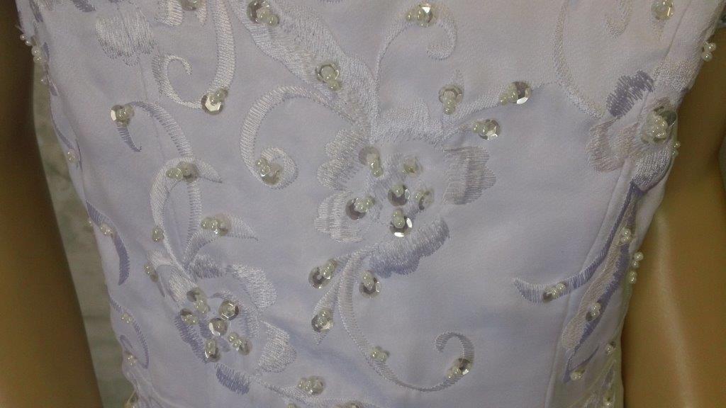 sequin and beading on embroidered bodice