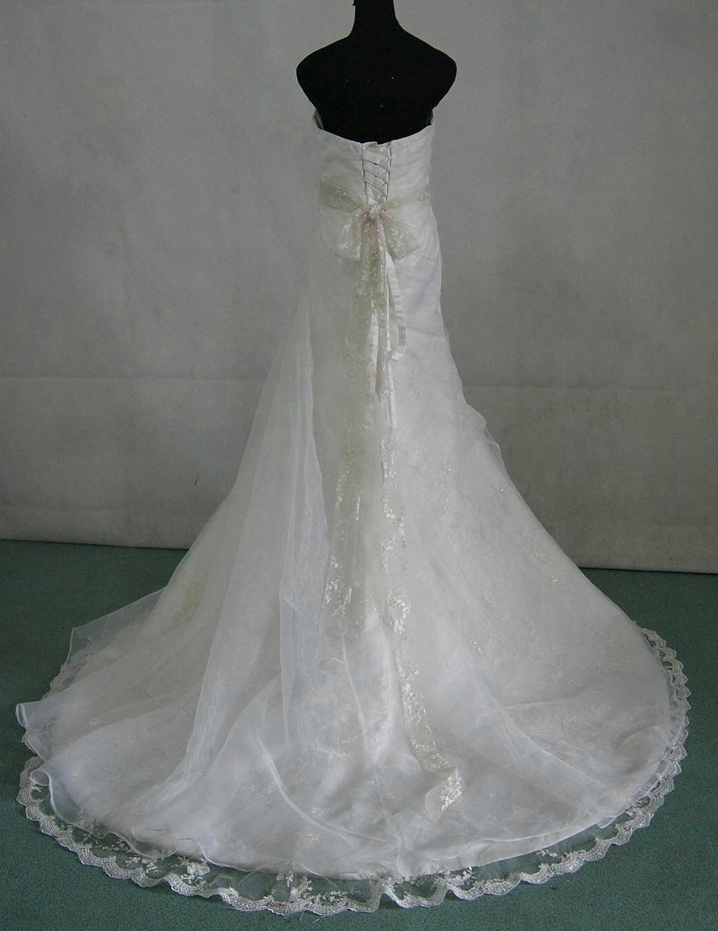Appliqued and beaded organza wedding gown