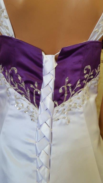 white and purple wedding gown