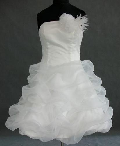 strapless feathered dress with fitted bodice and short pickup skirt