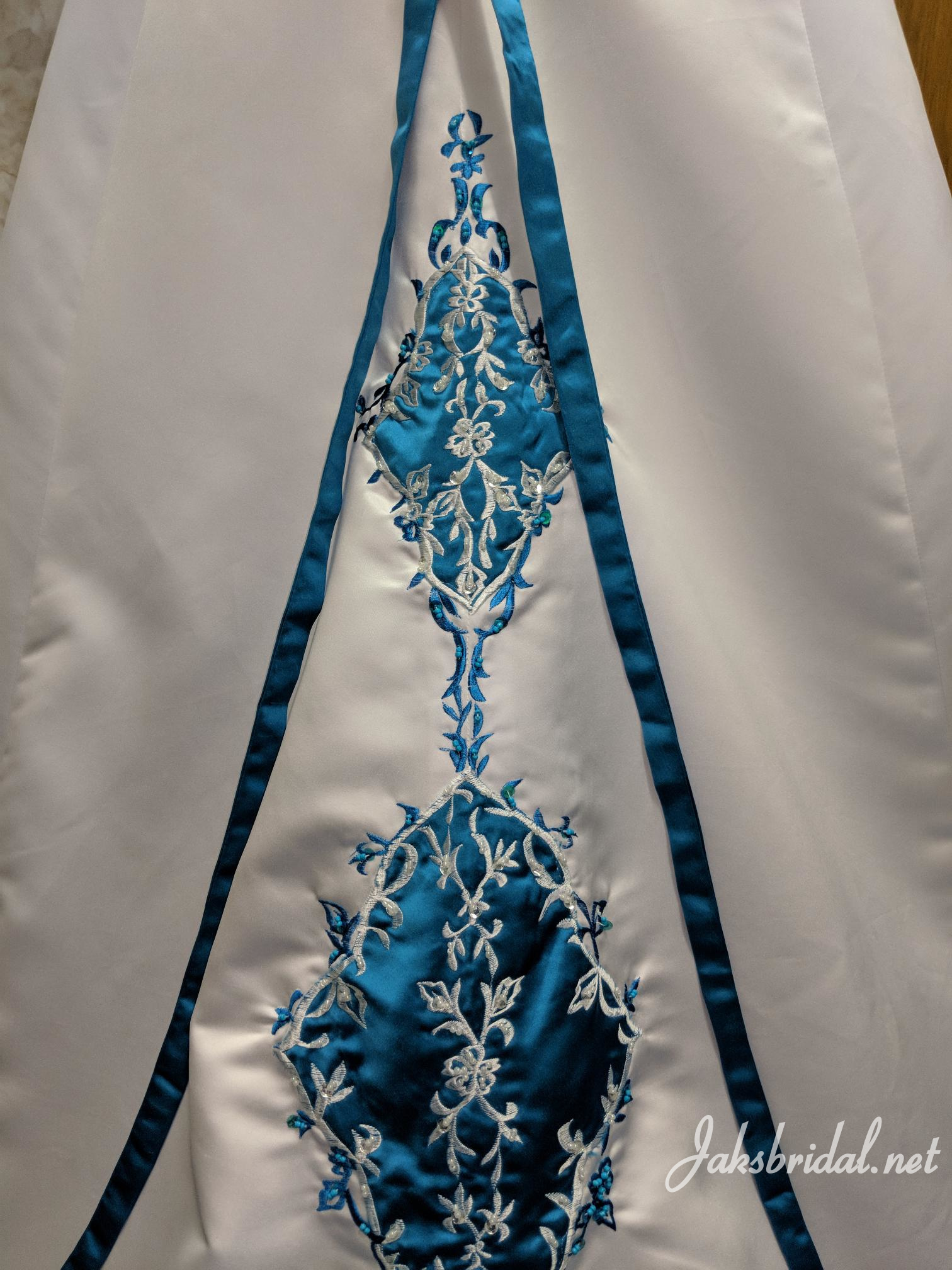 white and turquoise wedding dress