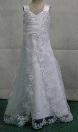 Miniature bridal gown with lace appliques.