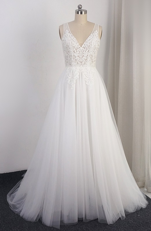 V-neck wedding gown with intricate lace flower appliques