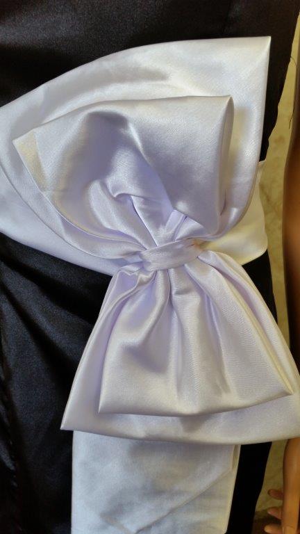 white bow sash