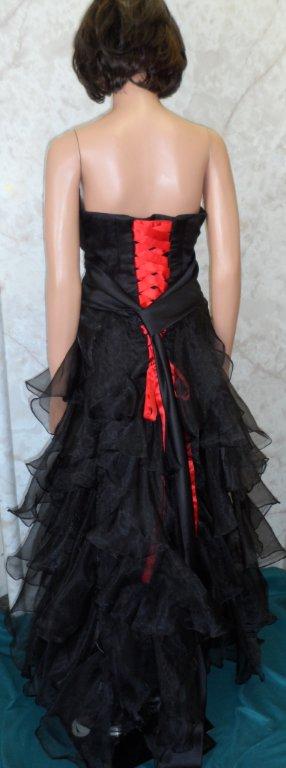Strapless black chiffon layered dress with red lace up back