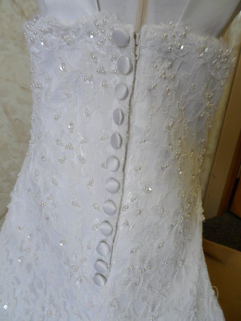 lace dress with covered buttons over zipper