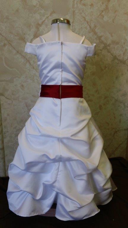 white dress with apple red sash