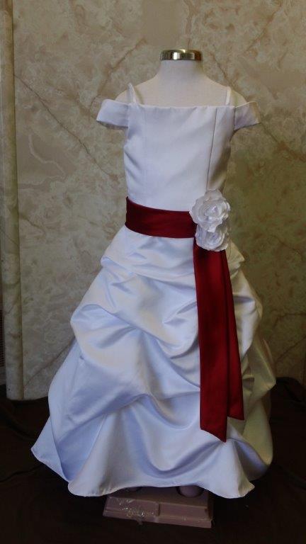 white dress with apple red sash