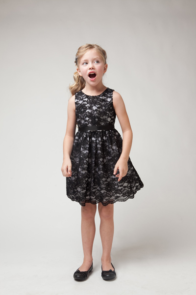 This black lace dress is just perfect for your little girls holiday.   Sleeveless and slightly above knee.  Size 6 @$40.00.