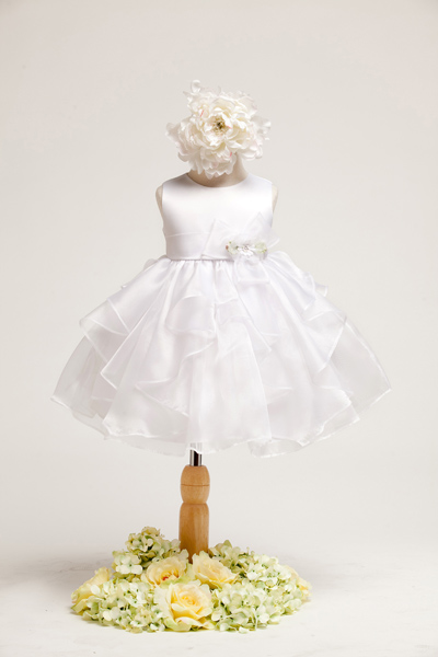 White infant girl dresses full of ruffles available in size extra large.