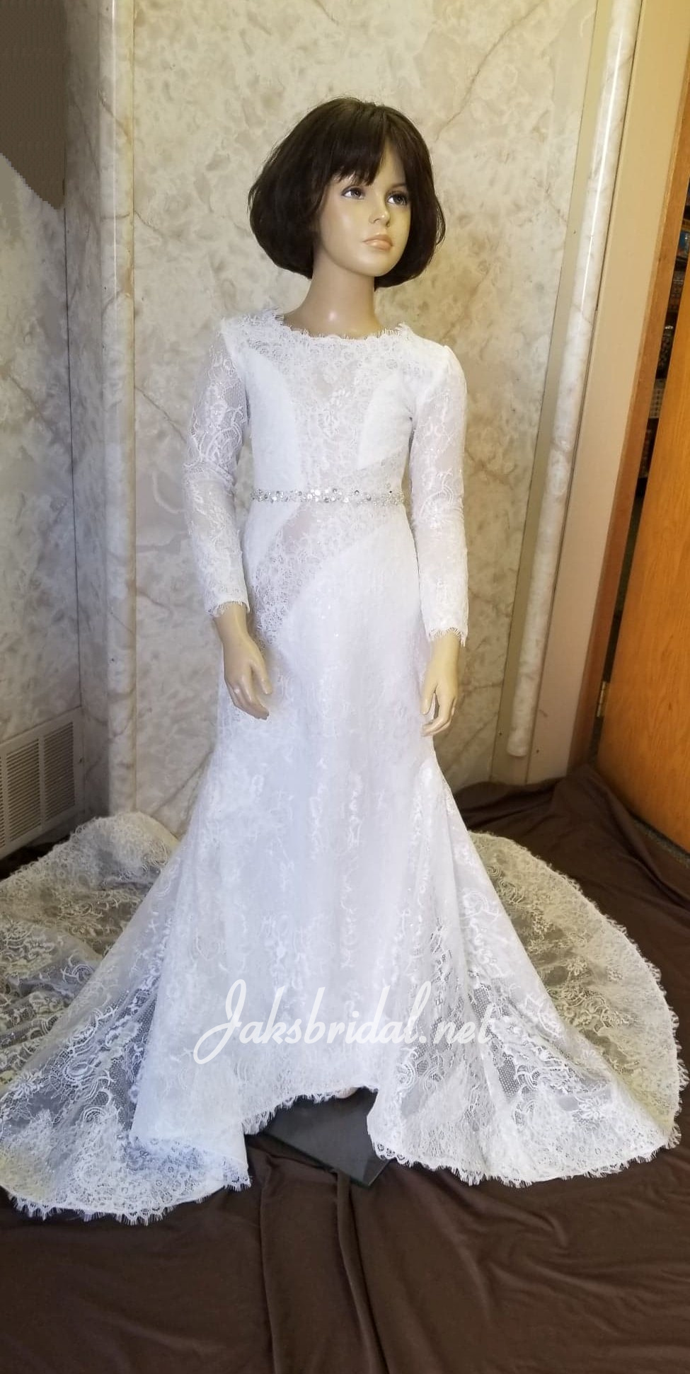 Long sleeve flower girl dress in lace and sequins, illusion sleeves, neck, back and train