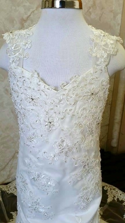 dress with cut out back and lace edged train