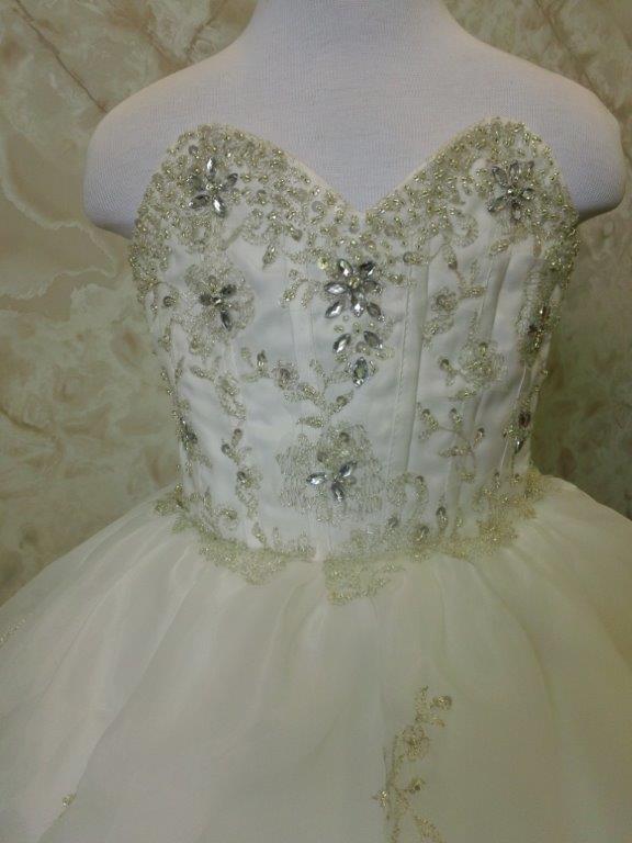 Jewel encrusted corset bodice with metallic accents