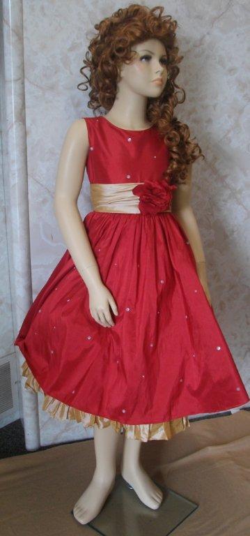 Sleeveless red and gold girls party dress.