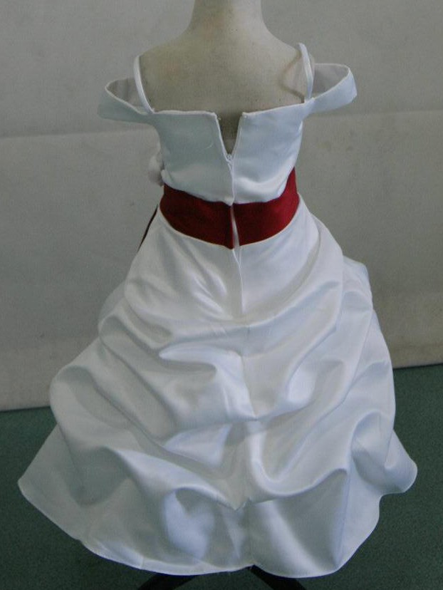 white satin gown with apple red sash