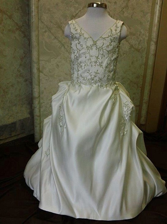 A line beaded gown with waterfall train