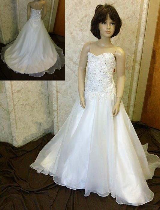 Flower girls dress to match the brides beaded wedding dress with lace