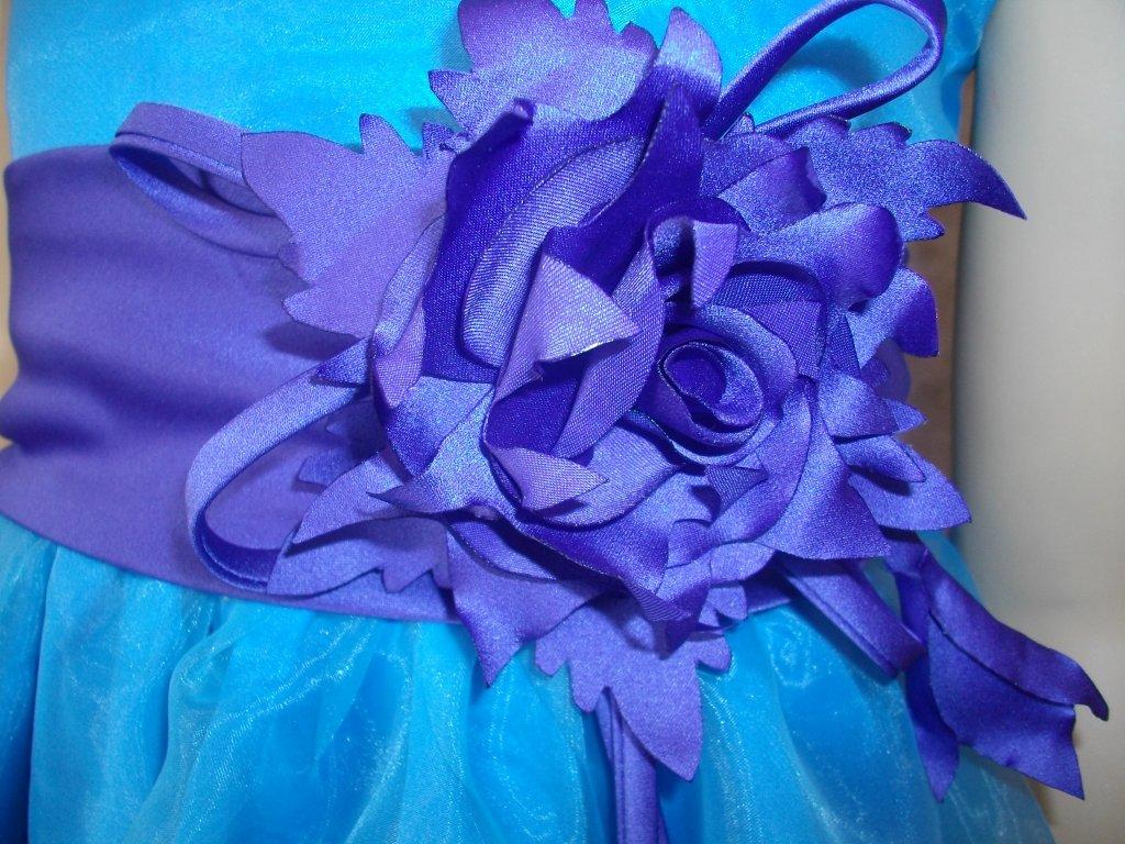 Flower girl dress in blue bonnet with Viking purple sash