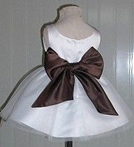 White infant dress with chocolate sash