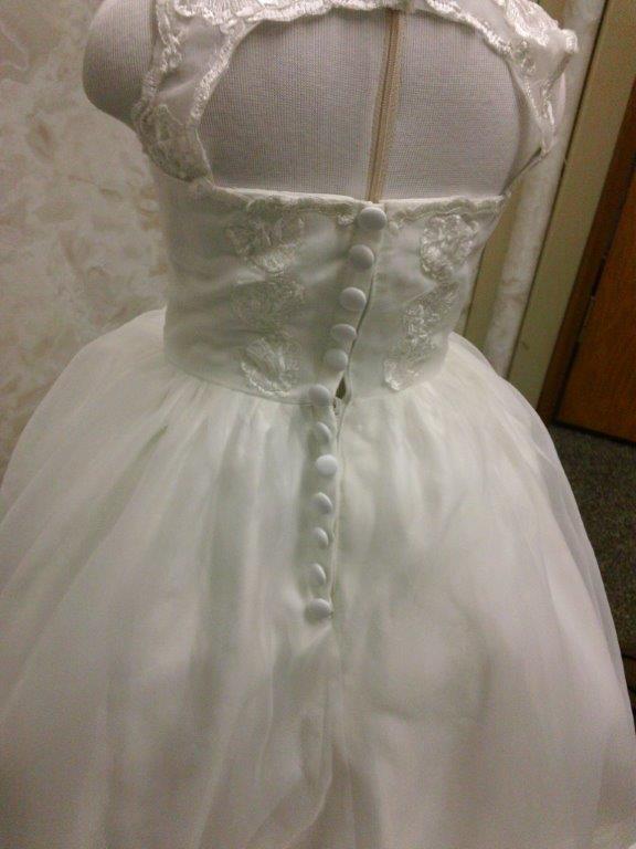 miniature wedding gown with covered buttons