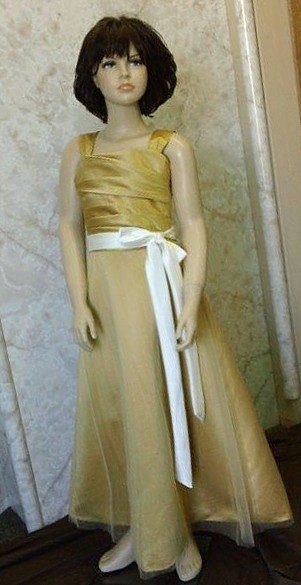Girls long gold dress with ivory sash, pleated bodice and tulle overlay.  Girls Size 8 is on sale for $40.