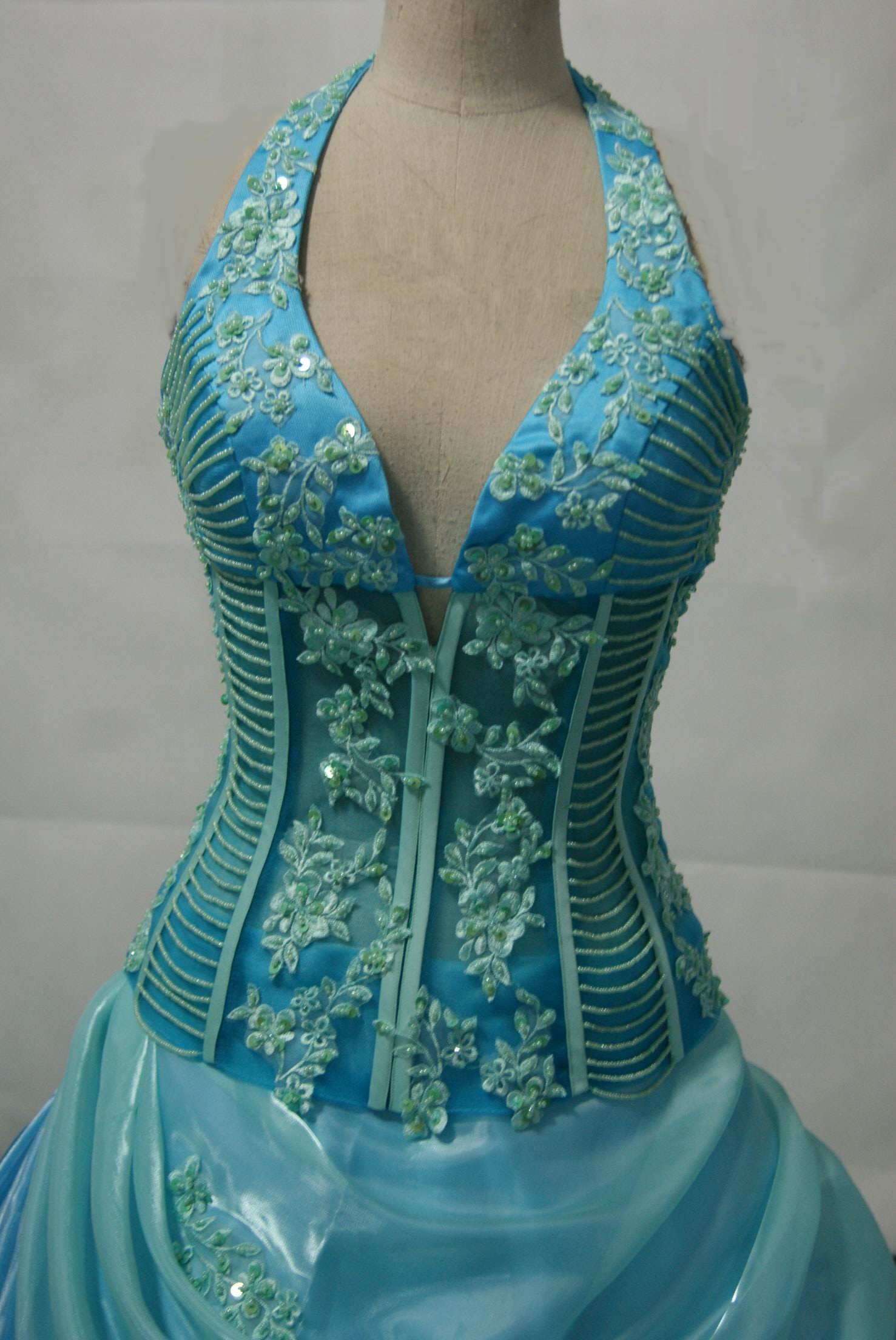 Corset gown with see through corset is lined with sheer sky blue