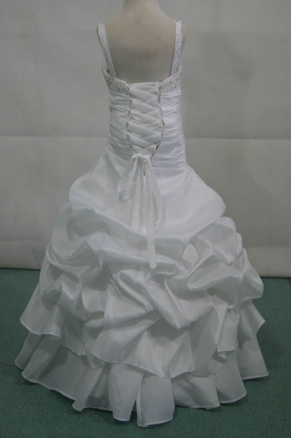 white pageant gown with silver beading