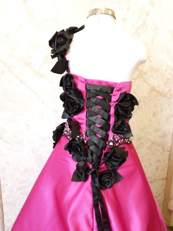 pink ball gown with black roses