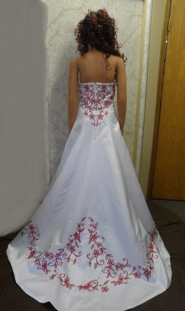 White wedding gown with red embroidery