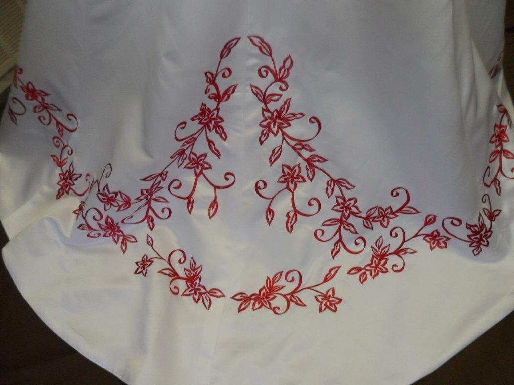 White wedding gown with red embroidery