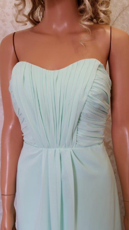 Long mint green bridesmaid dresses.