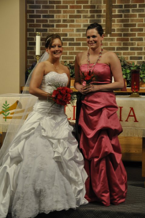 Lovely bride with her maid of honor