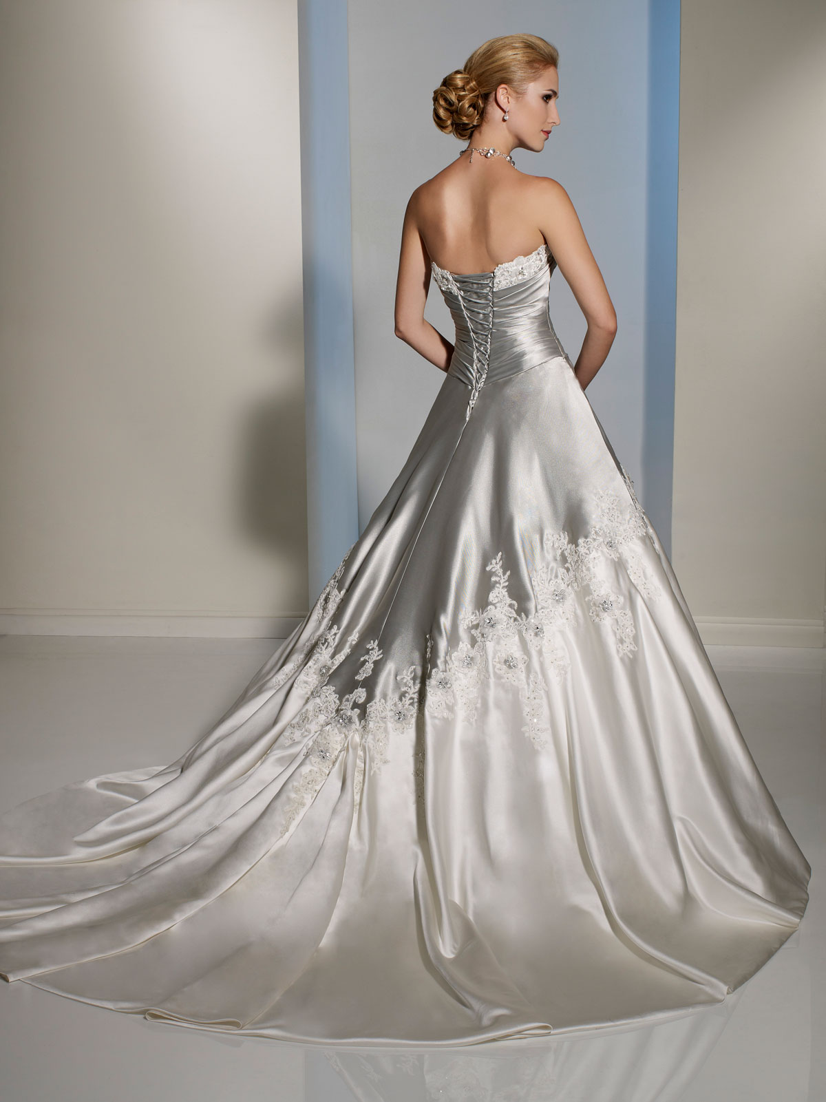 Silver and white draped bodice wedding dress.