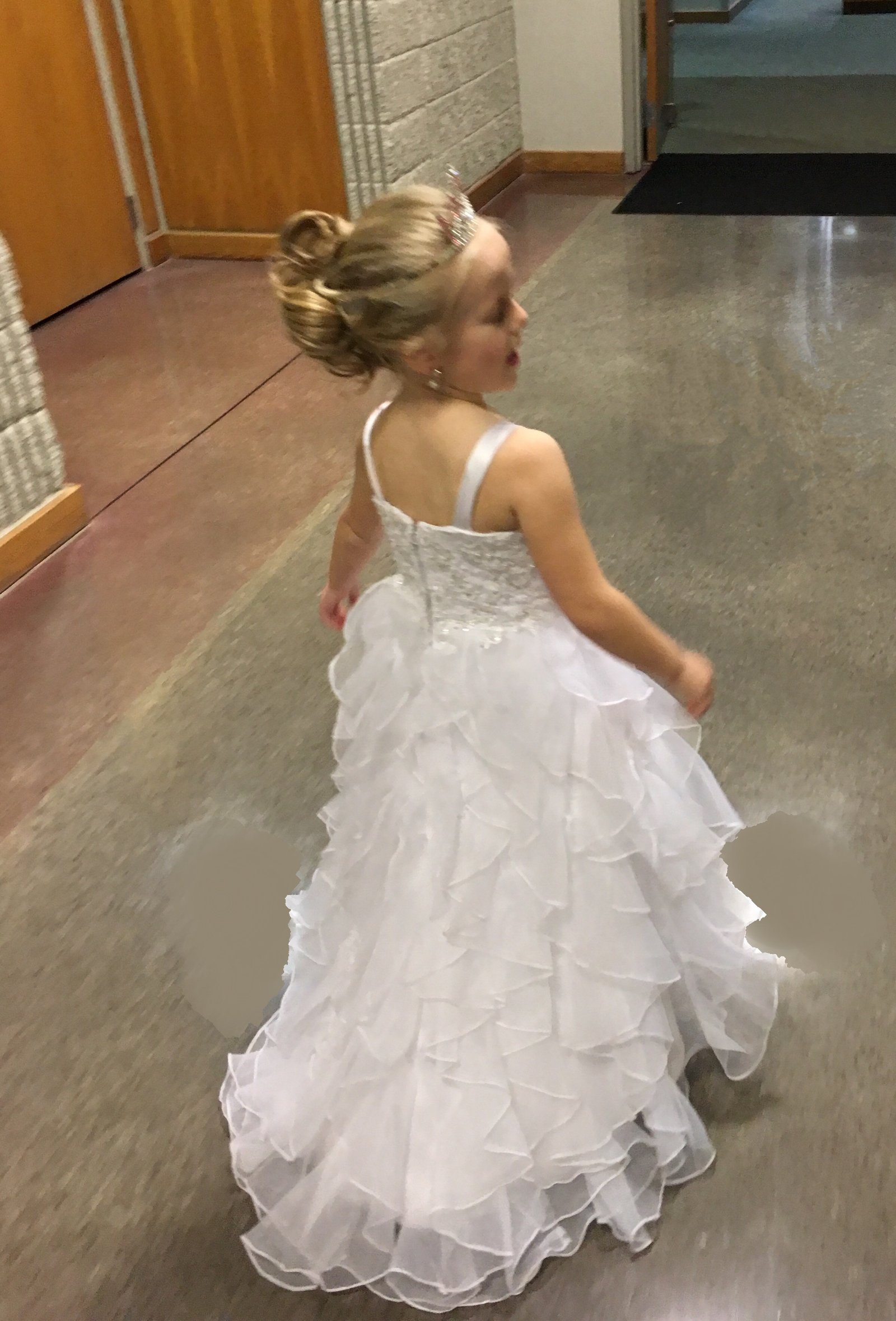 Organza Wedding dress for flower girls with a full ruffle train.