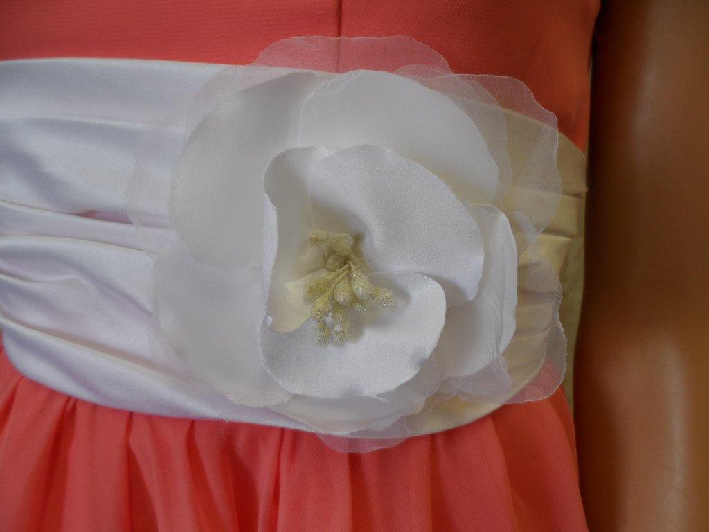coral and white pleated sash
