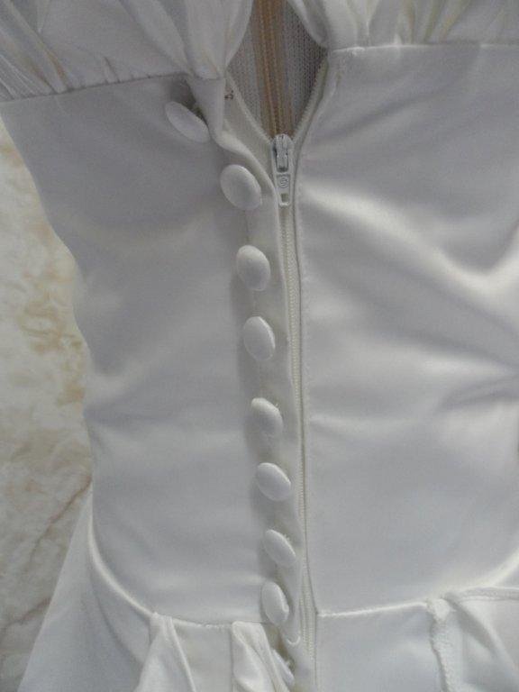 covered buttons over zipper