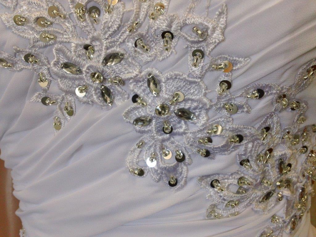 Lace applique wedding dress.