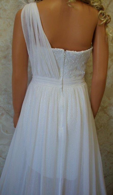 Illusion one shoulder pageant knee high gown with shimmering train.