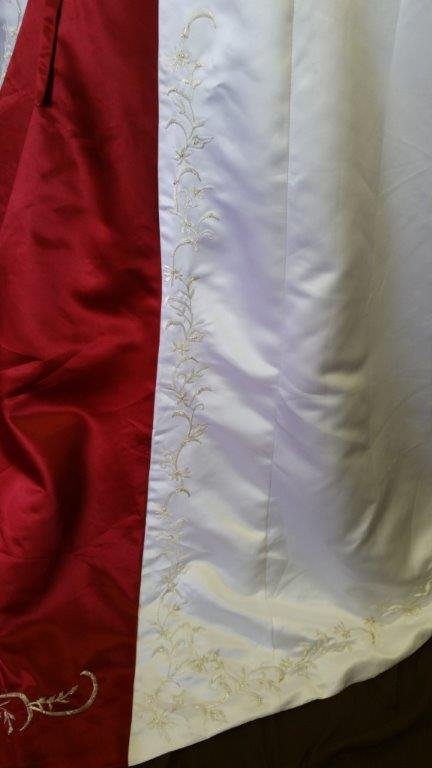 wedding gown with red accents