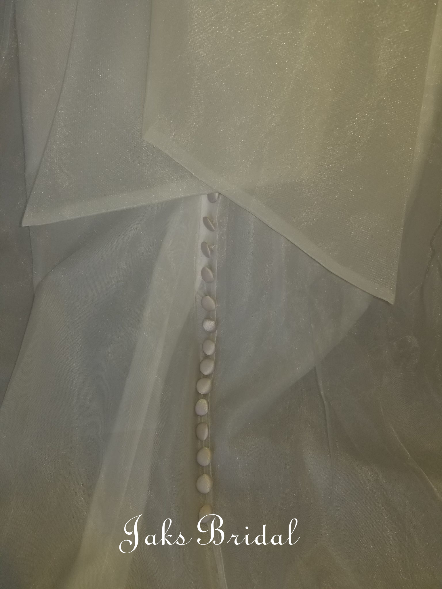 covered buttons down the back of organza dress