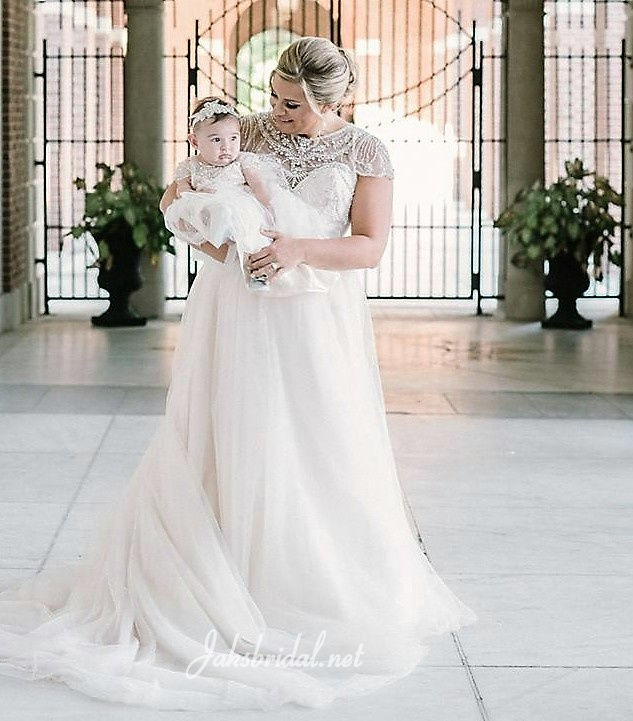 bride and matching infant flower girl dress