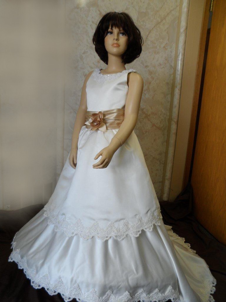 Complete little bride look with tiered lace trimmed layers.