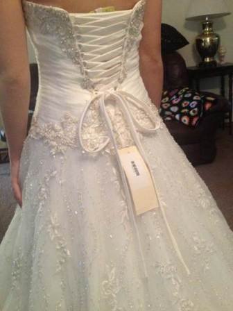 happy bride wants to match her dress to her daughters