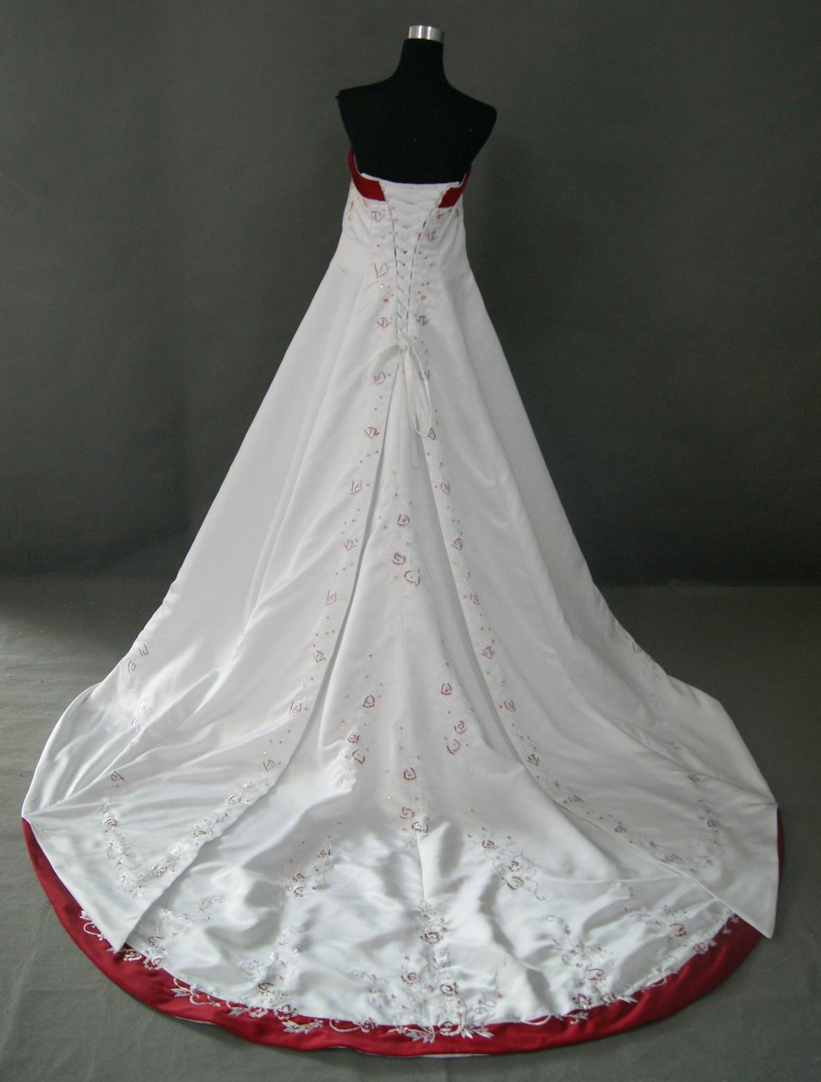 Wedding dress with red embroidered flowers